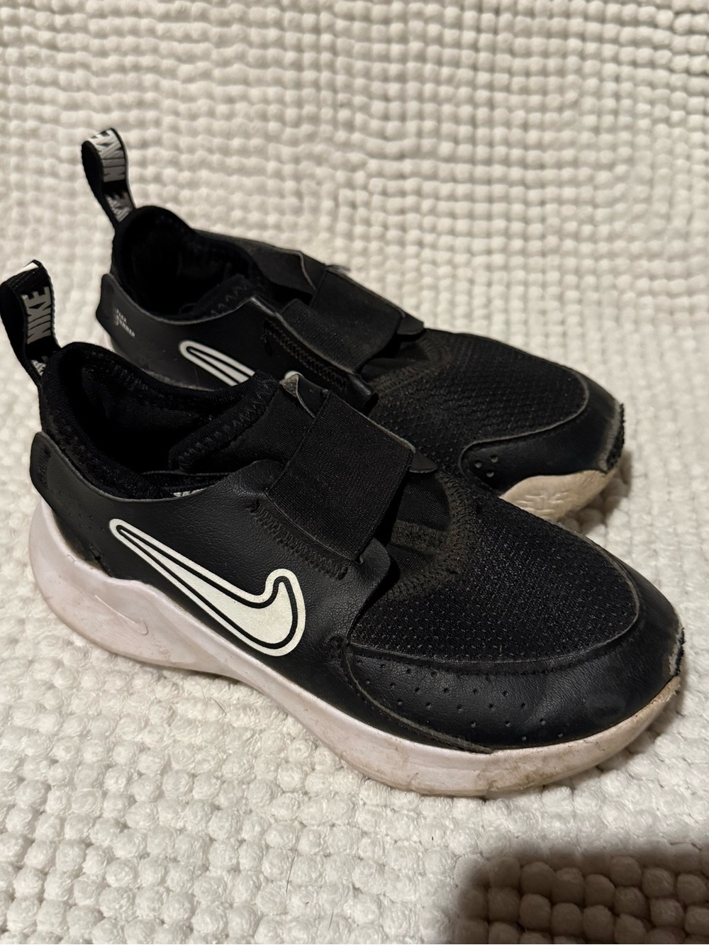 Nike Kids Black Slip-On Sneakers with White Swoosh